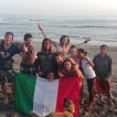 Group photo with the Italian flag.